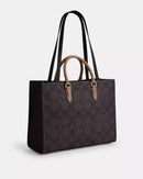Coach Maggie Tote Bag
In Blocked Signature Canvas