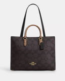 Coach Maggie Tote Bag
In Blocked Signature Canvas